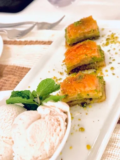 Traditional Baklava + Ice Cream at White Olive Mediterranean restaurant NYC